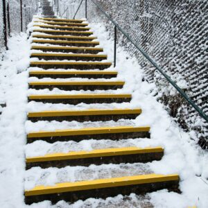 Grippy Stair Tread on stairs covered with snow/ice