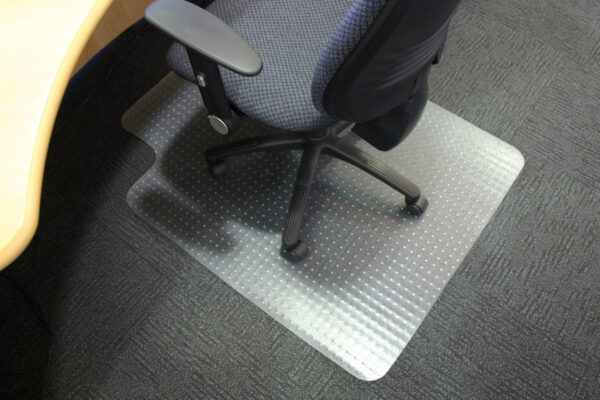 Chair on a mat on carpet flooring