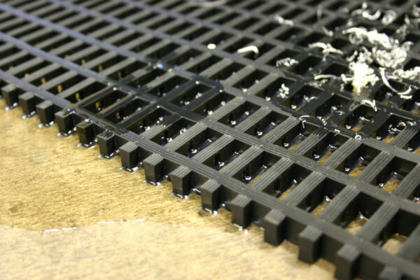 close up of black Heavy Duty Woven PVC Mat
