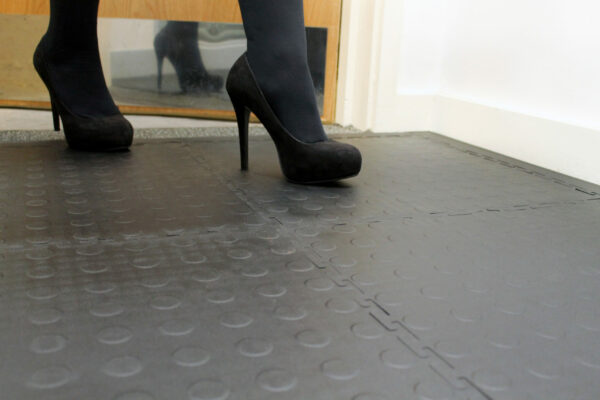 High heels walking on Interlocking tiles