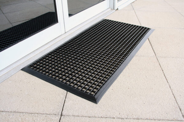 Black Outdoor Entrance Mat outside doors to a house