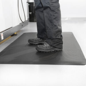 Man standing on a lack Ramped Mat