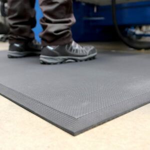 Person stood on a Solid Hygienic Anti-Fatigue Mat